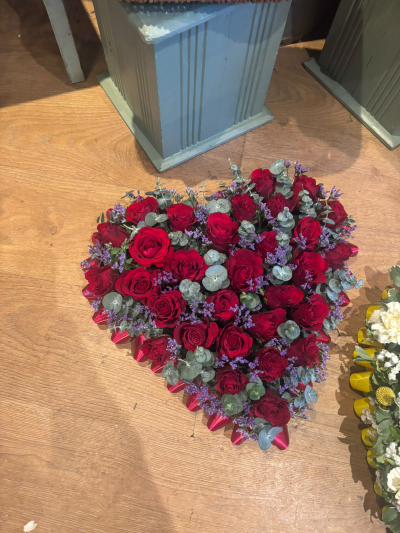 Red Rose Heart - A classic heart-shaped tribute in rich, romantic tones, created to express everlasting love and treasured memories.
