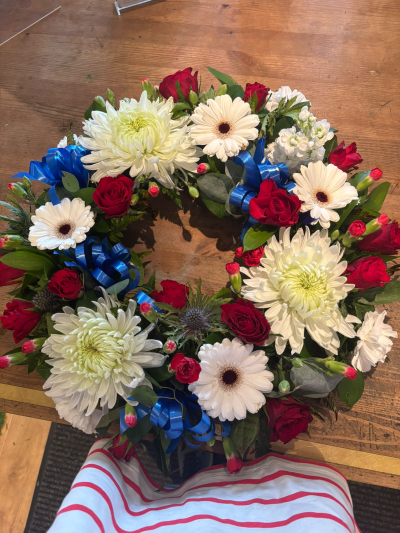 Cherished Memories - A striking circular tribute featuring bold colours and elegant ribbon detailing, created as a heartfelt expression of love and remembrance.