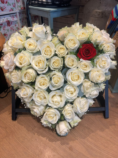 Eternal Love - A luxurious heart-shaped tribute, carefully arranged as a beautiful expression of everlasting love and cherished memories.