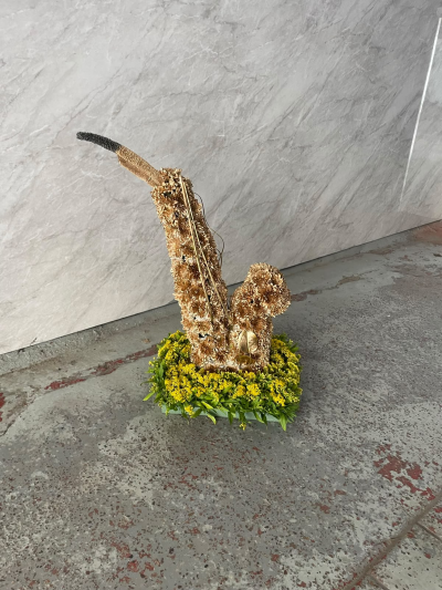 Saxophone - A unique personalised tribute designed to celebrate a love of music, creating a fitting and meaningful farewell.