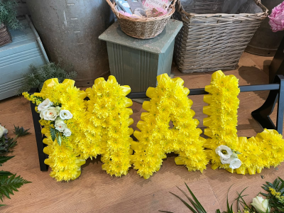 Colourful Letters - A custom letter tribute designed to celebrate a loved one's name or nickname, creating a meaningful and lasting expression of love and remembrance.