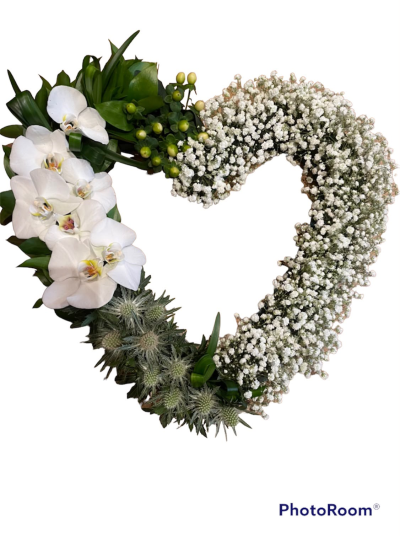 Elegant Orchid Wreath - A graceful open wreath combining contemporary styling with timeless elegance, thoughtfully created as a beautiful tribute to a cherished loved one.