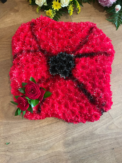 Poppy Funeral Tribute - A beautiful and meaningful poppy tribute, thoughtfully created to honour a loved one with dignity and respect. Symbolising remembrance, sacrifice and everlasting gratitude, this bespoke design provides a heartfelt way to celebrate a life and pay tribute to cherished memories.